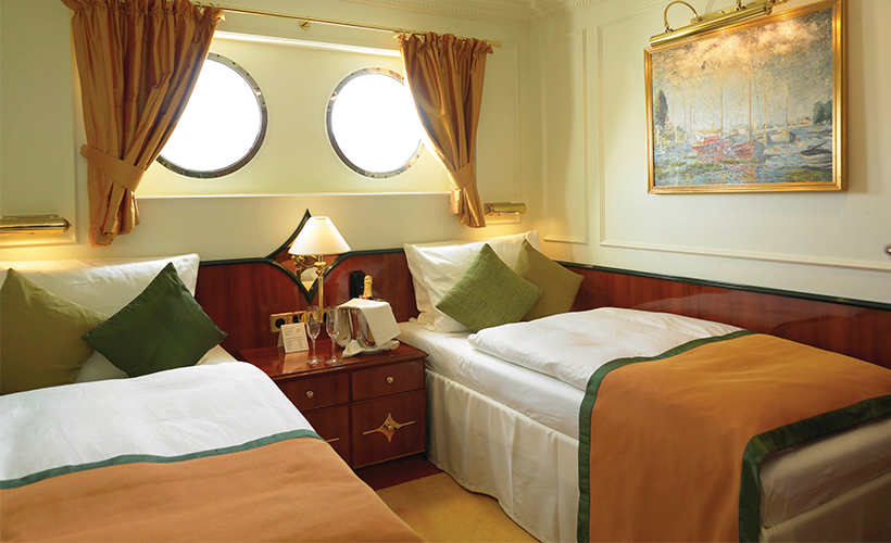 The Deluxe cabin on the Royal Crown cruise ship of Hebridean Island Cruises