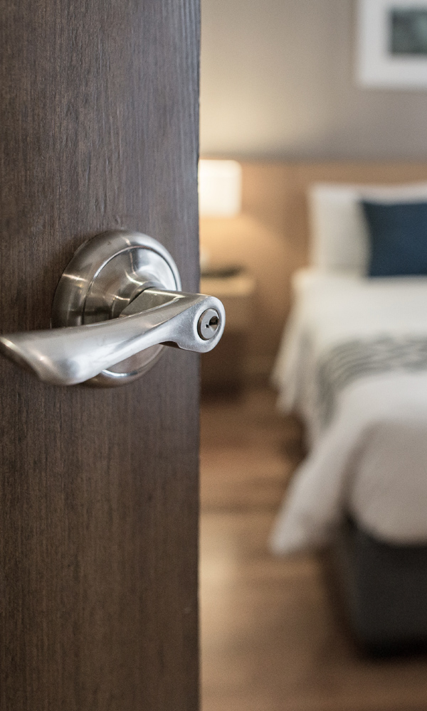 Door opening into a hotel room