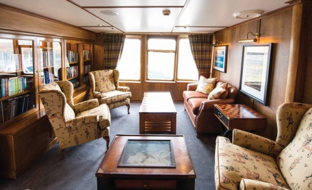 The library on board the Hebridean Princess cruise ship of Hebridean Island Cruises