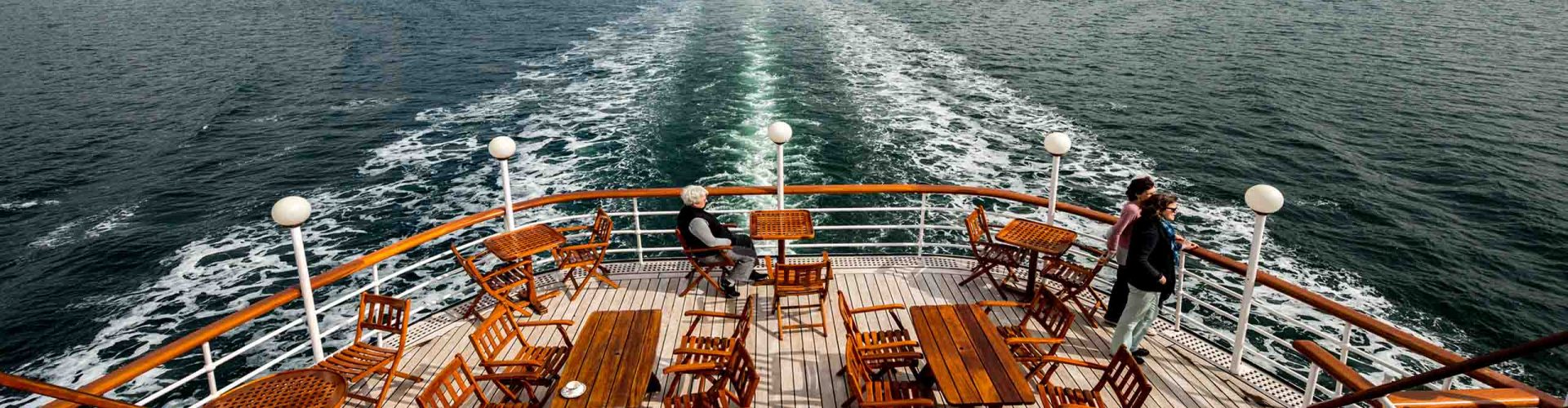 The outdoor seating area on the Promenade Deck on the Hebridean Princess cruise ship of Hebridean Island Cruises