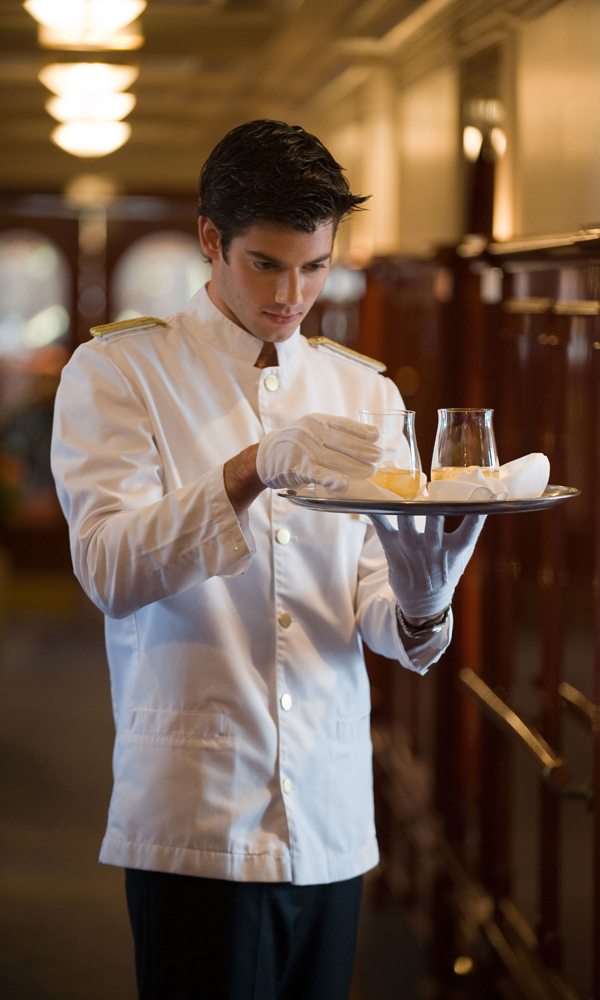 Waiter carrying drinks on a tray