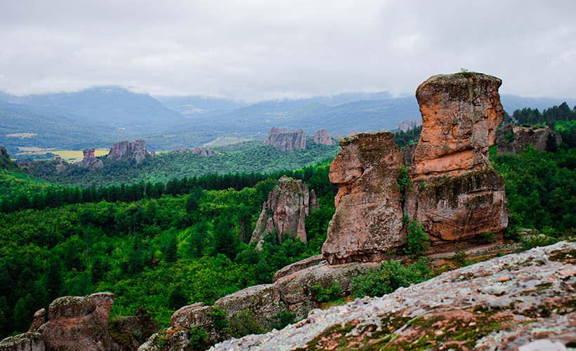 The spectacular rocks in the Belogradchick mountains with lush greenery surrounding them