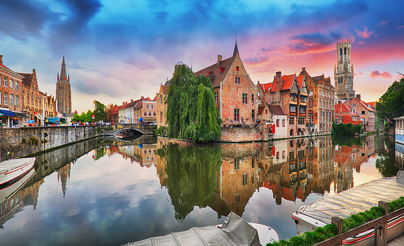 The old buildings of Bruges in Belgium lining the canal