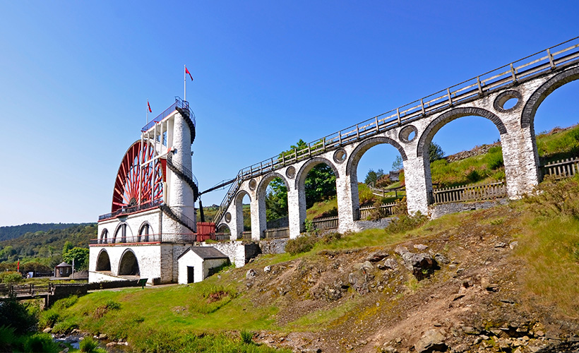 The Laxey Wheel built into the hillside above the village of Laxey on the Isle of Man