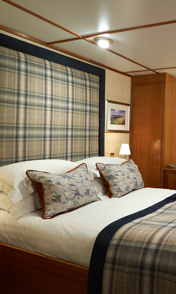 The bed in Lews Castle Cabin on the Waterfront Deck on the Hebridean Princess cruise ship of Hebridean Island Cruises